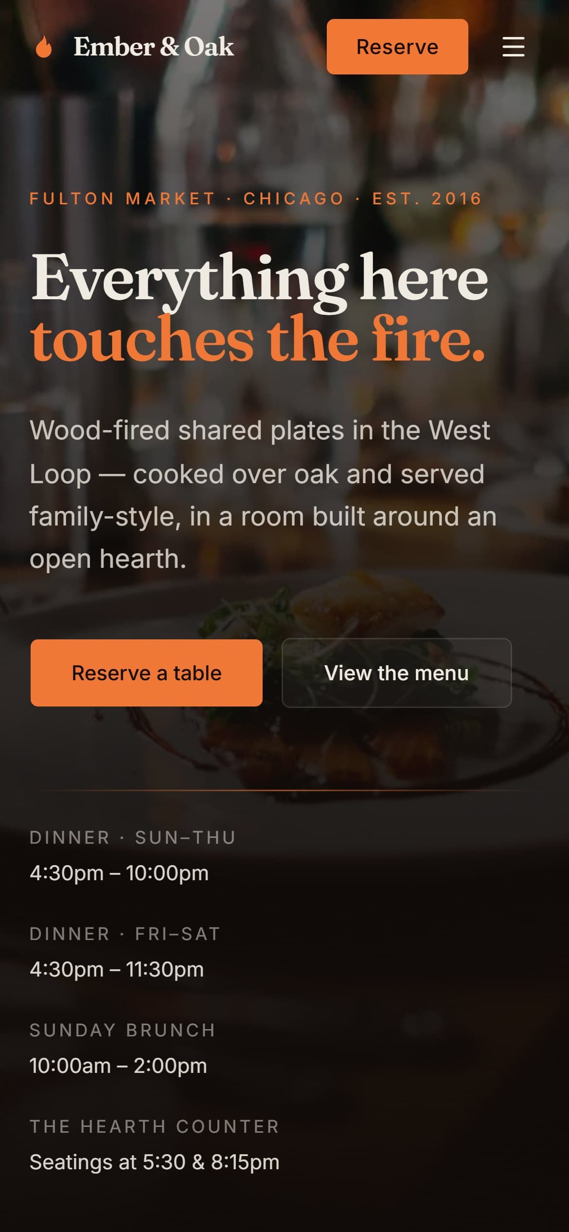 Ember & Oak homepage on a mobile phone